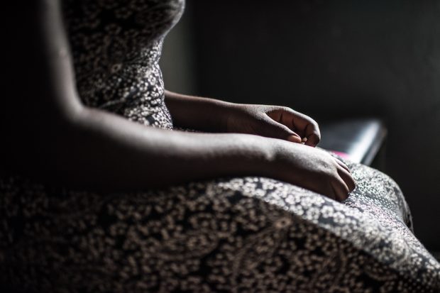 Photo of the hands of a survivor of unsafe abortion survivor
